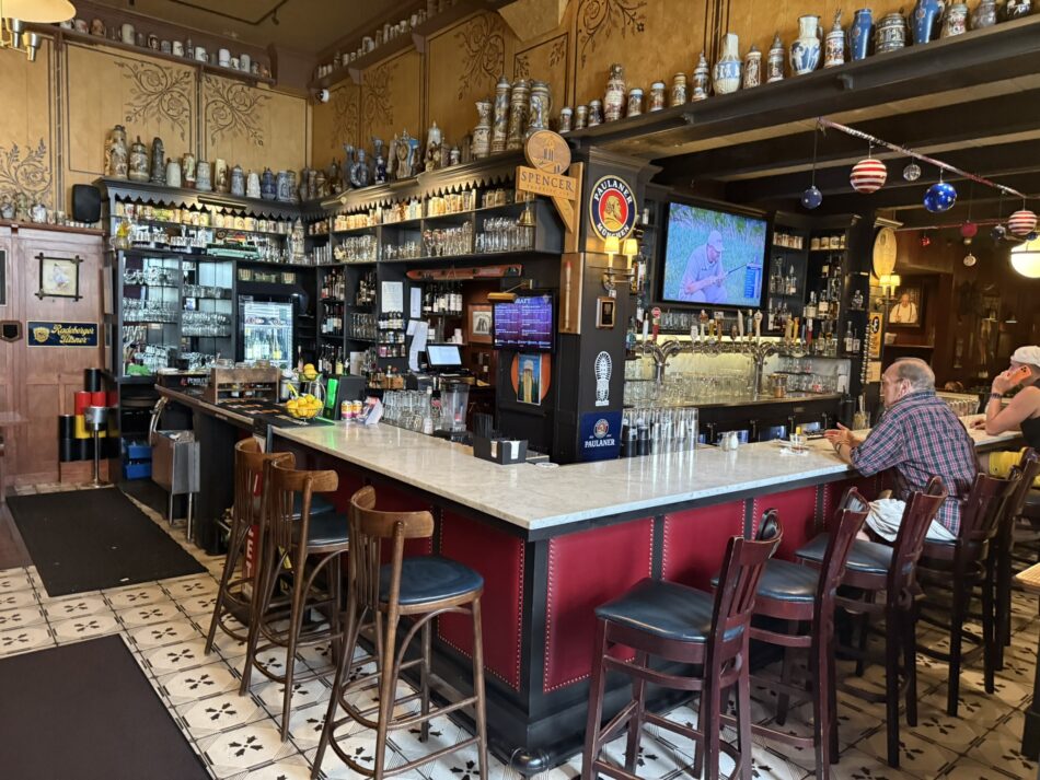 The bar at the Student Prince in Springfield, displaying more antique beer steins.