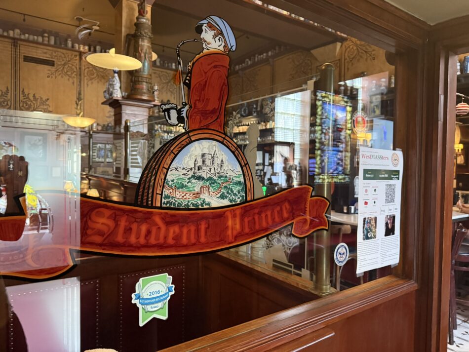 The entryway to The Student Prince in Springfield, sporting the logo in the window.